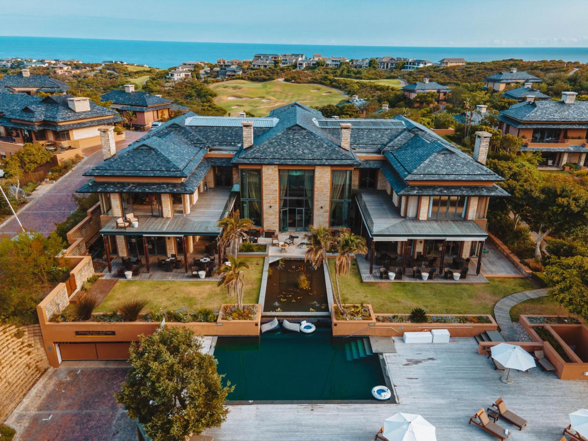 Pezula Nature Retreat Knysna Exterior photo A villa at the Pearl Valley golf estate